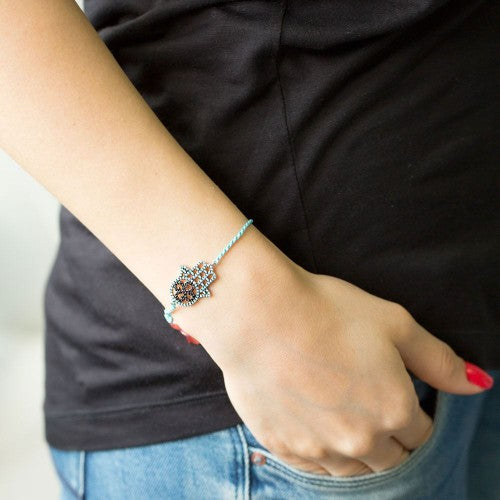 Bracelet Main de Fatma en turquoise et en soie