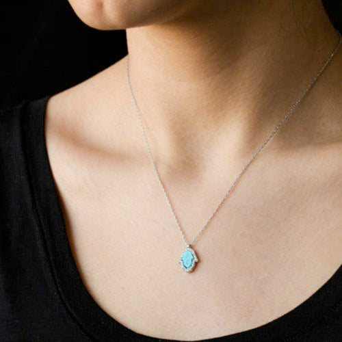 Collier pendentif "Main de Fatma" en turquoise